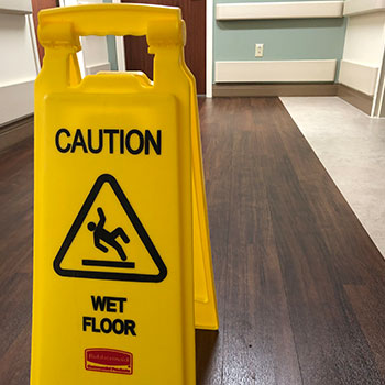 A caution slippery floor sign at tristar hendersonville